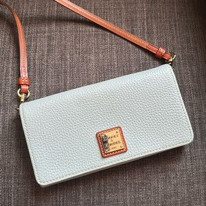 Rooney & Bourke cross body wallet in light blue/turquoise.